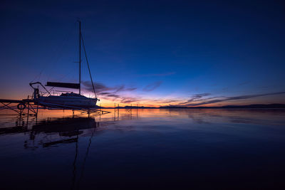 Scenic view of lake balaton against sky at sunset.