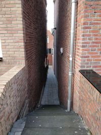 Narrow alley along buildings