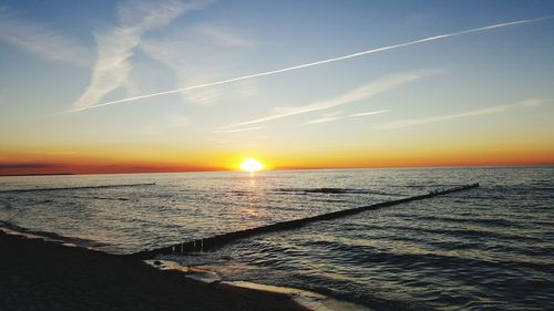 Scenic view of sunset over sea