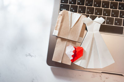 High angle view of red umbrella on table