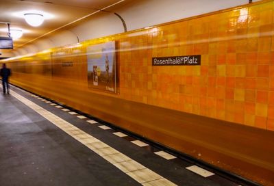 Illuminated railroad station platform