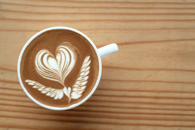 Directly above shot of cappuccino on table