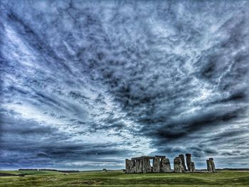 Scenic view of dramatic sky over land