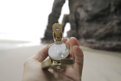 Close-up of person holding candle