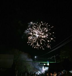 Low angle view of firework display