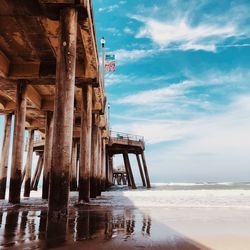 Pier over sea against sky