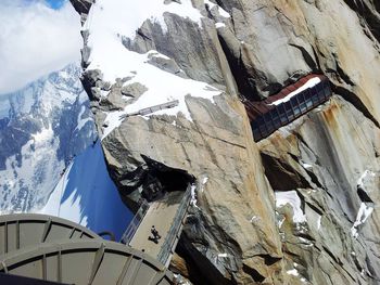 High angle view of bridge on snow covered mountain