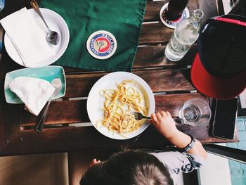 High angle view of people on table at restaurant