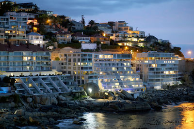 Buildings in city at night