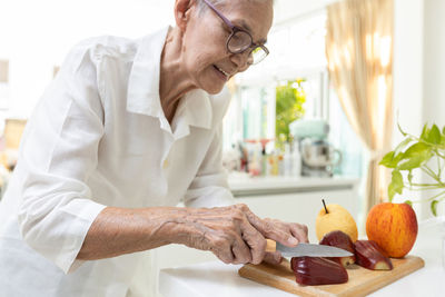 Man preparing food in kitchen