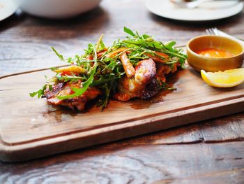 Close-up of food on serving board at table