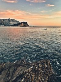 Scenic view of sea against sky during sunset