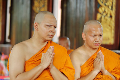 Monks having ordination ceremony at temple