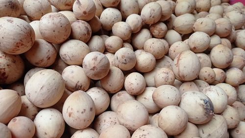 Full frame shot of onions for sale at market