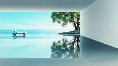 Digital composite image of swimming pool by sea against sky