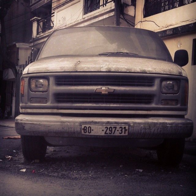 transportation, mode of transport, land vehicle, car, street, road, abandoned, old, building exterior, old-fashioned, outdoors, no people, stationary, travel, obsolete, headlight, day, text, truck, train - vehicle