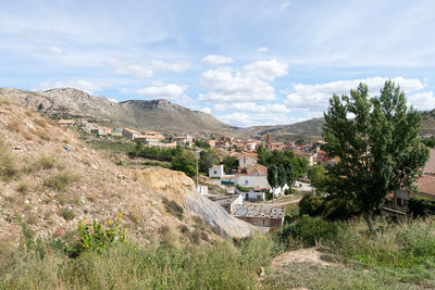 Scenic view of townscape against sky