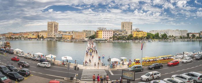 High angle view of people by boats in river