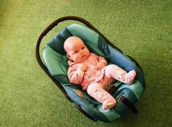 High angle view of cute baby lying down