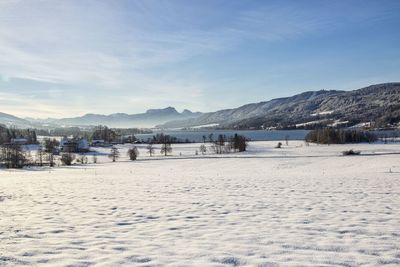 Scenic view of snowcapped mountains against sky