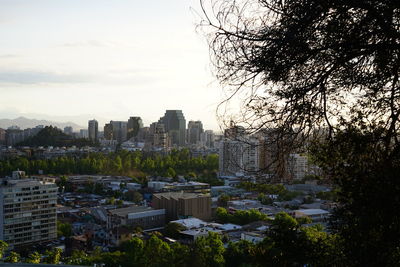 Cityscape against sky during sunset