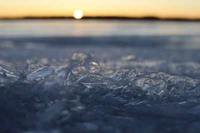 Surface level of frozen sea during sunset