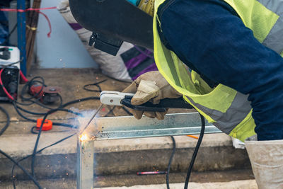 Welder working at construction site