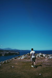 Rear view of man looking at view