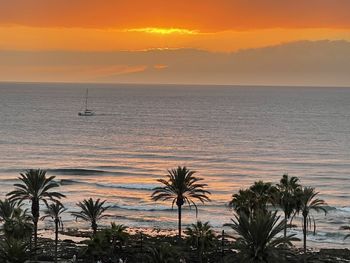 Scenic view of sea against sky during sunset