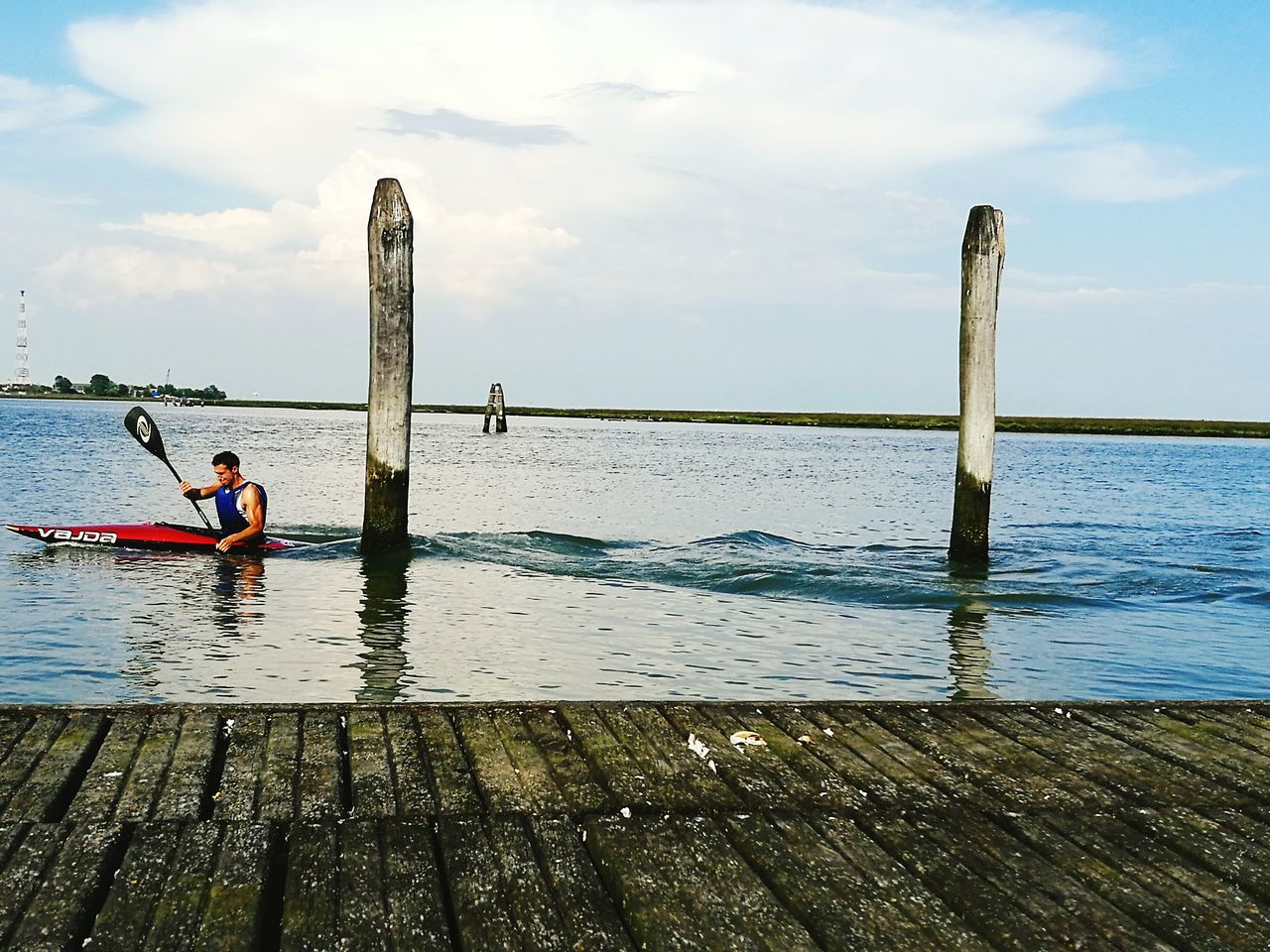 water, sky, sea, nautical vessel, cloud - sky, pier, wooden post, tranquility, rope, horizon over water, safety, nature, cloud, day, pole, wood - material, tranquil scene, transportation, protection, rippled