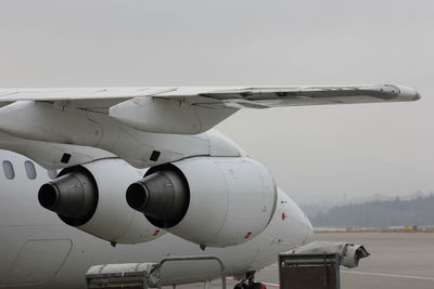 Close-up of airplane against sky