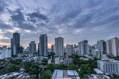 Buildings in city against sky