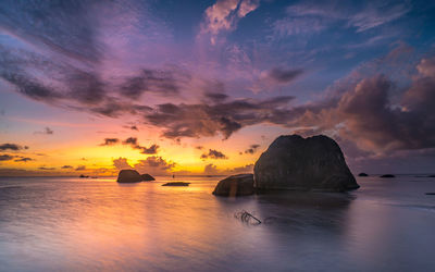 Scenic view of sea against sky during sunset