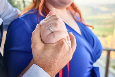 Close-up of woman holding hands
