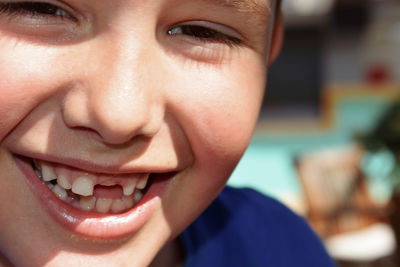 Close-up portrait of smiling boy