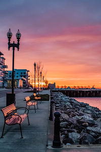 City street against orange sky