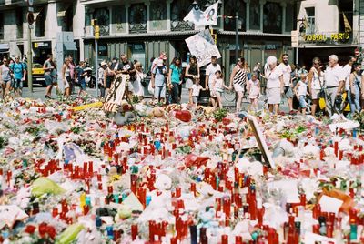People standing on street in city