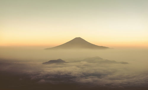 Scenic view of mountains against sky during sunset