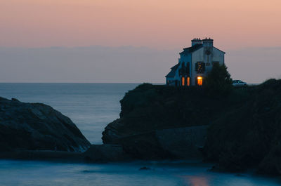 Scenic view of sea at sunset