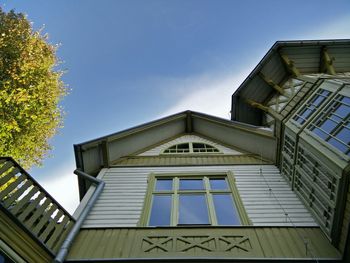 Low angle view of building against blue sky