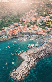Aerial view of townscape by harbor