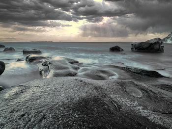 Scenic view of sea against sky during sunset