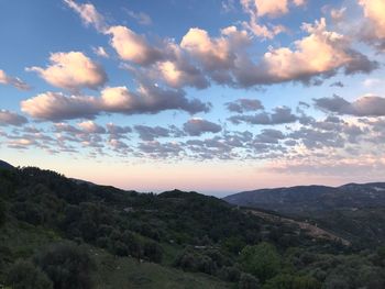 Scenic view of mountains against sky during sunset