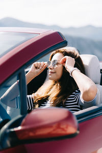 Portrait of woman in car