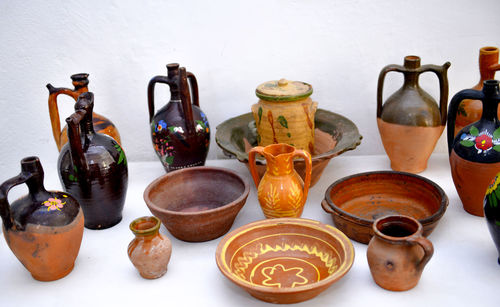 High angle view of bottles on table against wall