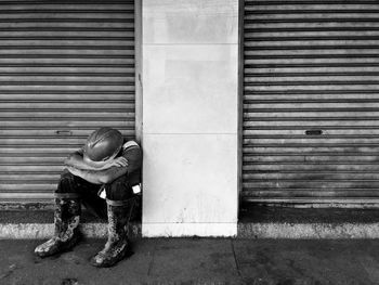 Worker sleeping on street