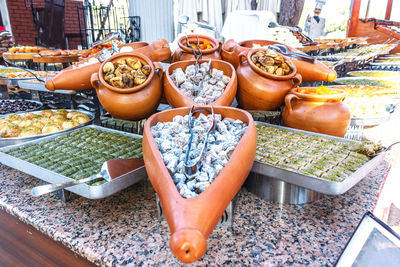 Traditional turkish desserts baklava and lokum in open buffet restaurant at hotel 