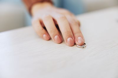 Cropped image of woman with nail polish