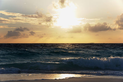 Scenic view of sea at sunset