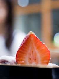 Close-up of strawberry slice in plate